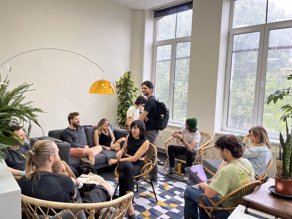 Community members gathered in the Commons Hub living room